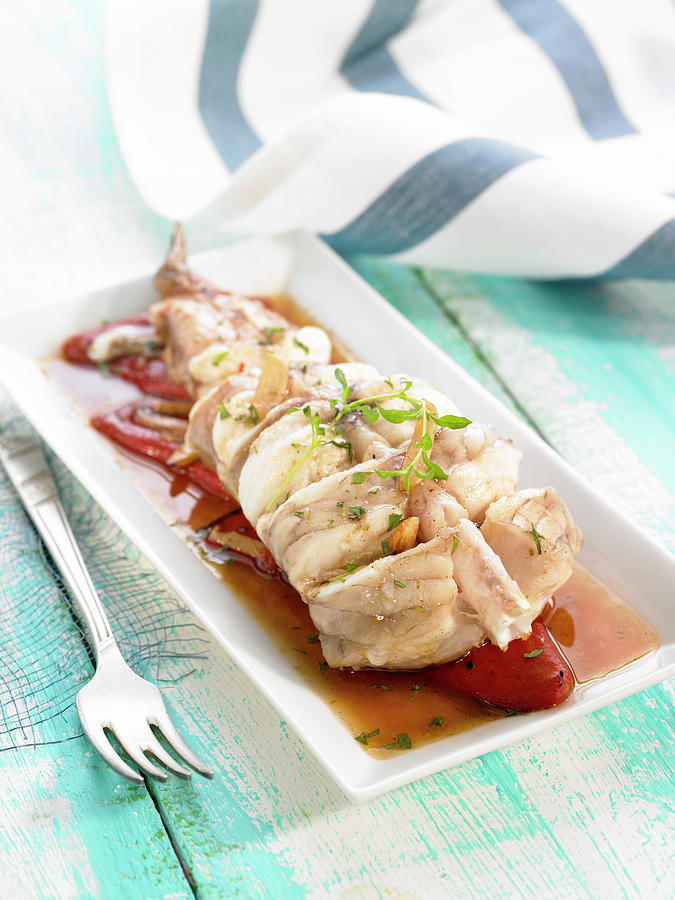 Monkfish Tail With Garlic And Red Peppers Photograph by Lawton