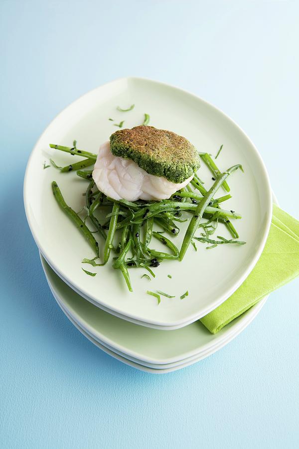 Monkfish With Coriander And Mustard Crust Served With Sesame Seed Beans Photograph by Michael Wissing