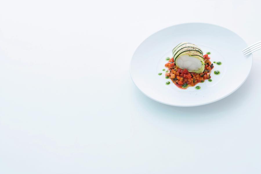 Monkfish Wrapped In Courgette On A Pepper Salsa Photograph by Michael Wissing