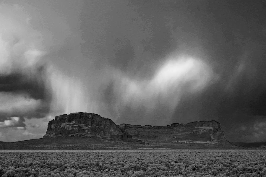 monochrome storm over Fort Rock Photograph by Brent Bunch