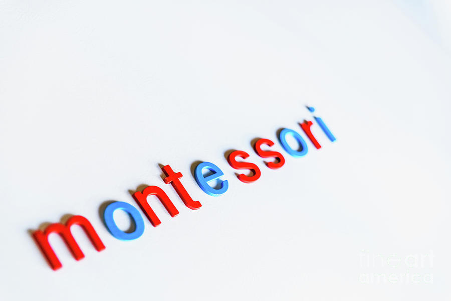 Montessori Word Written With Colorful Letters On White Backgroun Photograph