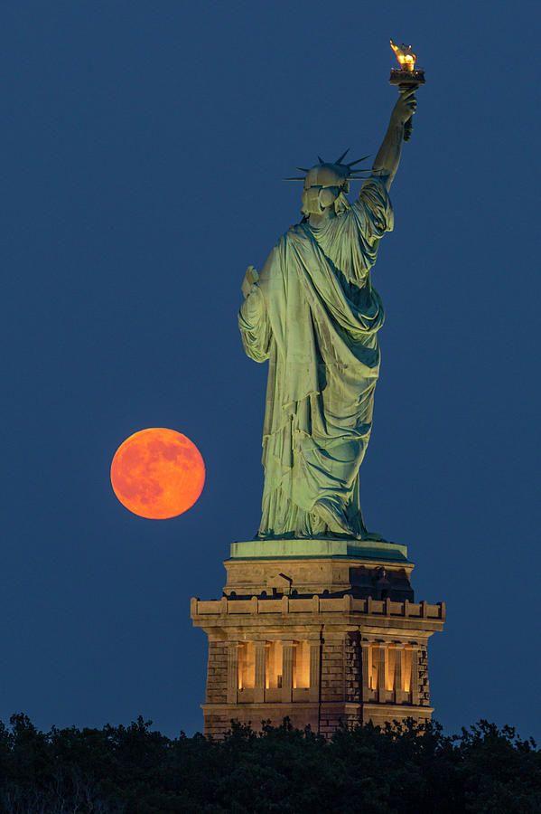 Moon Rise By Statue Of Liberty Photograph by Susan Candelario
