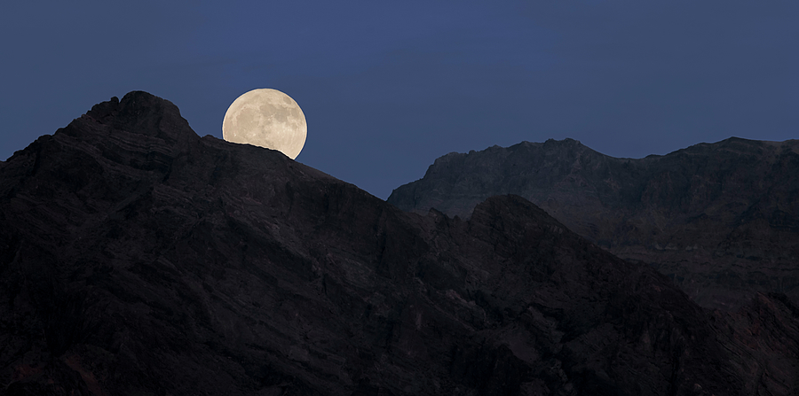 Moonrise Over the Funeral Mountains Photograph by Loree Johnson