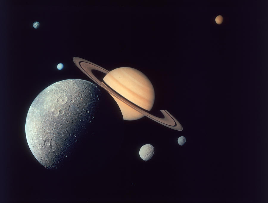 Moons Of Saturn Photograph by Space Frontiers