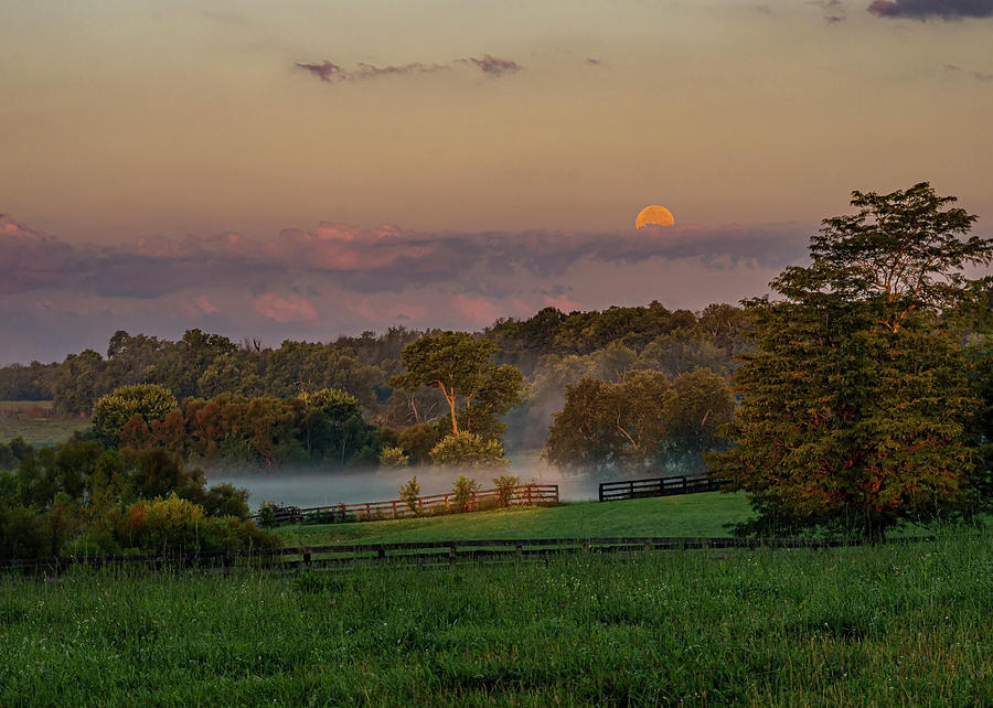 Moonset at Sunrise Photograph by Ulrich Burkhalter