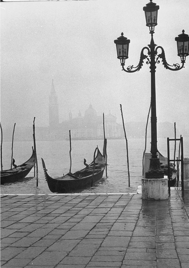 Moored Gondolas On A Foggy Grand Canal W Photograph by Dmitri Kessel Moored Gondolas On A Foggy Grand Canal W Photograph by Dmitri Kessel