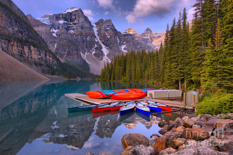 Moraine Lake Canoes And Reflections Photograph by Adam Jewell