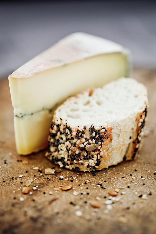 Morbier Cheese On A Board With Seeded Photograph by Richard Boll