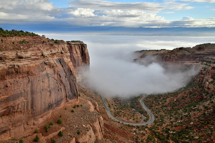 Morning Fog Creeps Up Fruita Canyon Photograph by Ray Mathis