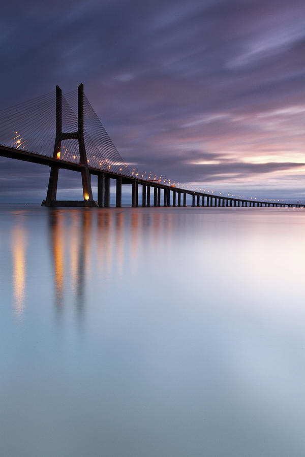 Morning Mirror- Vasco Da Gama Bridge Photograph by Searching For The Light