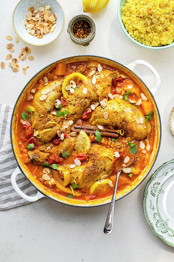 Moroccan Chicken Casserole With Bowl Of Couscous On The Side Photograph by Lucy Parissi