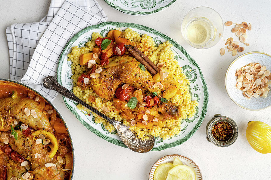 Moroccan Chicken Tagine With Cast Iron Casserole On The Side Photograph by Lucy Parissi