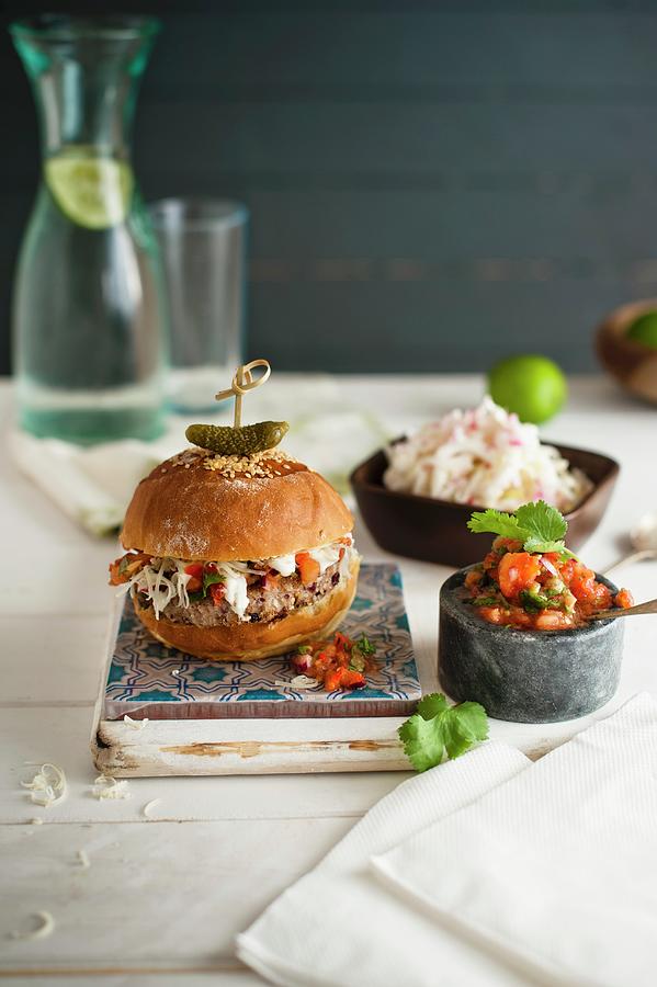Moroccan Lamb Burger With Mint Yoghurt, Coleslaw And Spicy Tomato Relish Photograph by Magdalena Hendey