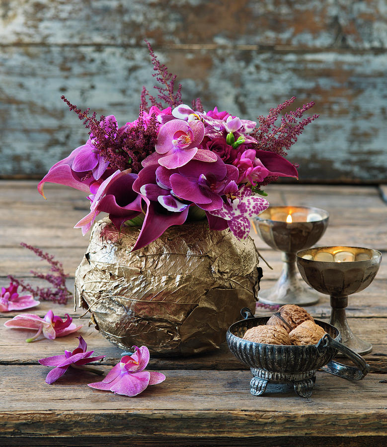 Moth Orchids And Astilbes In Golden Bowl Photograph by Alena Hrbkov