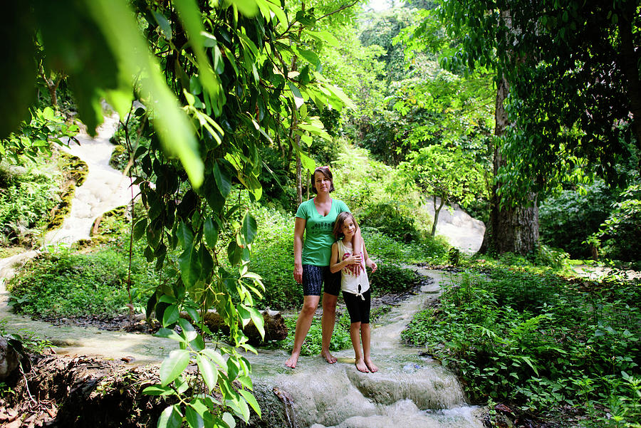 Mother And Daughter Standing At Bua Thong Waterfalls Photograph by ...