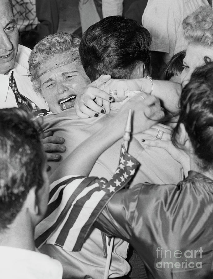 Mother Embracing Returning Pow Son Photograph by Bettmann