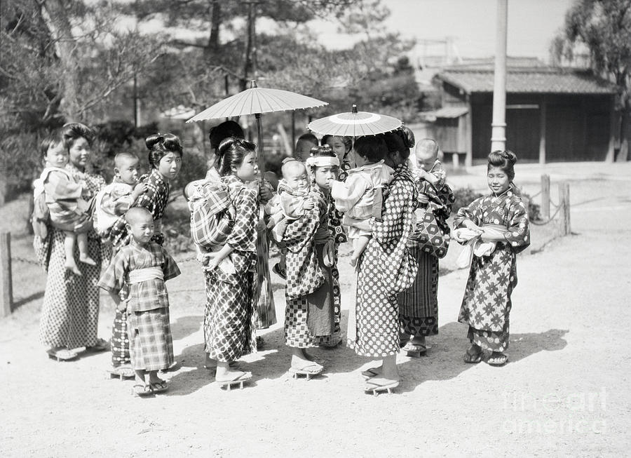 Mothers Carrying Young Children In Kyoto Photograph by Bettmann