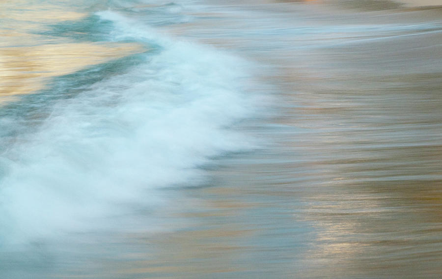 Motion Of Surf On The Beach Photograph by Stuart Mccall