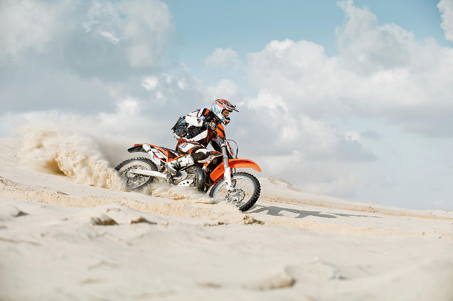 Motor Cross Riding Over Sand Photograph by Charlie Yacoub