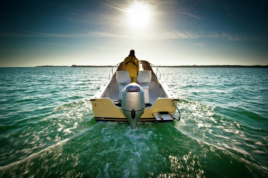 Motorboat On Sea At Sunset Photograph by Win-initiative Motorboat On Sea At Sunset Photograph by Win-initiative