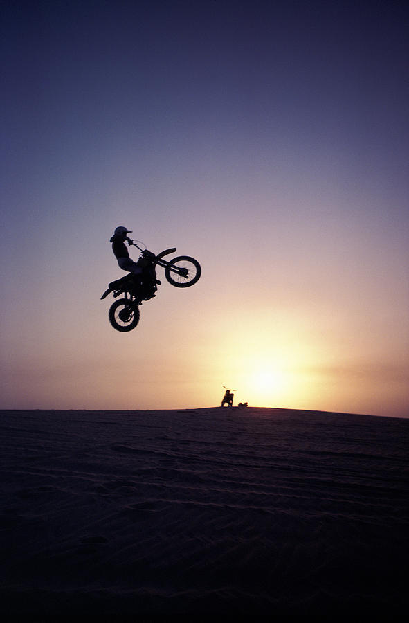 Motorcyclist In Mid-air Jump Photograph by James Porto