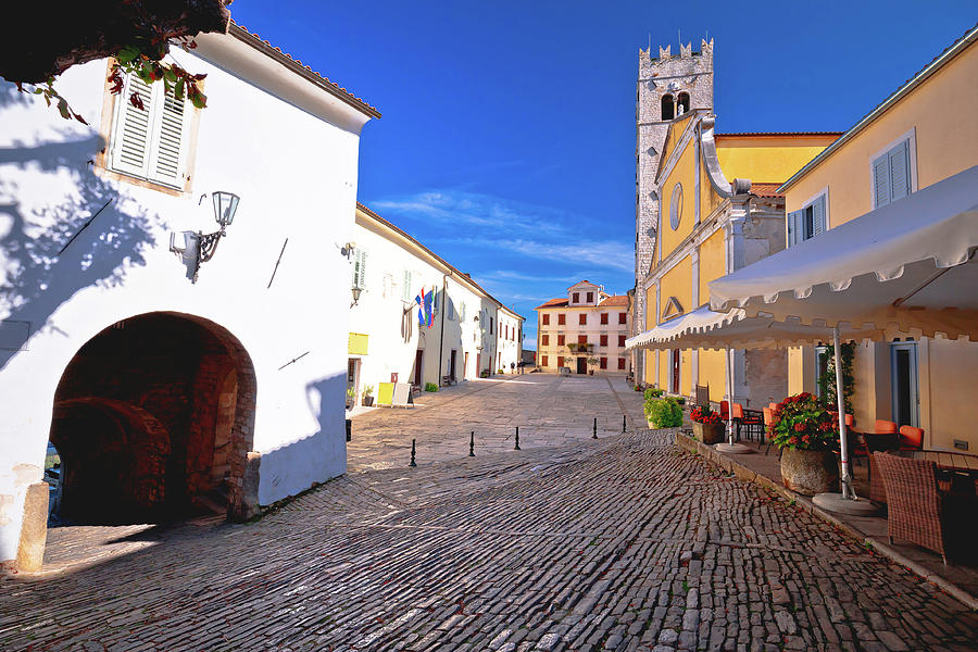 Motovun. Main stone square and church in historic town of Motovu Photograph by Brch Photography