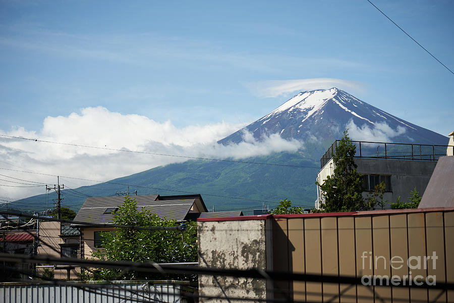 Adventure Photograph - Mount Fuyji from a distance with clouds around it by Lukas Kerbs Adventure Photograph - Mount Fuyji from a distance with clouds around it by Lukas Kerbs