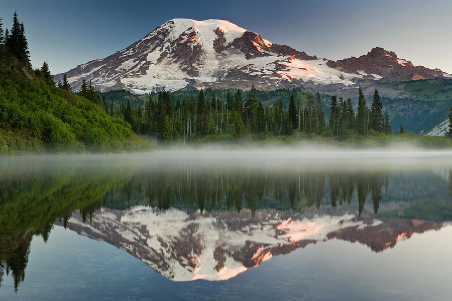 Mount Rainier Reflected In One Of Many Photograph by Mint Images - Art Wolfe
