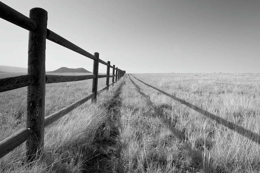 Mountain Framed In Split Rail Fence Photograph by Jon Paciaroni