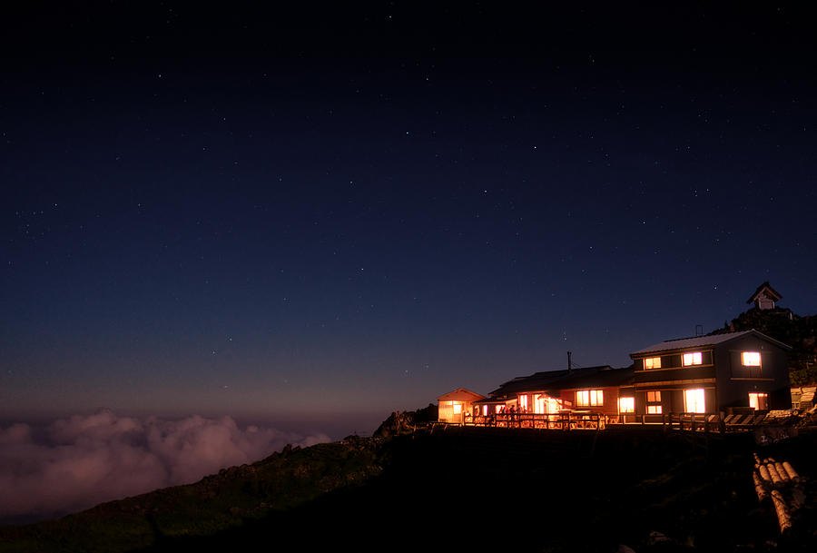 Mountain Hut Under The Night Sky Photograph by Yuta Kimura