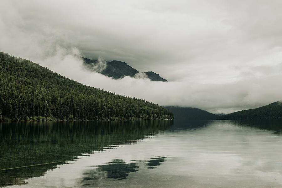 Mountains And Clouds Behind Bowman Lake, Glacier National Park, Montan Photograph by Cavan Images Mountains And Clouds Behind Bowman Lake, Glacier National Park, Montan Photograph by Cavan Images