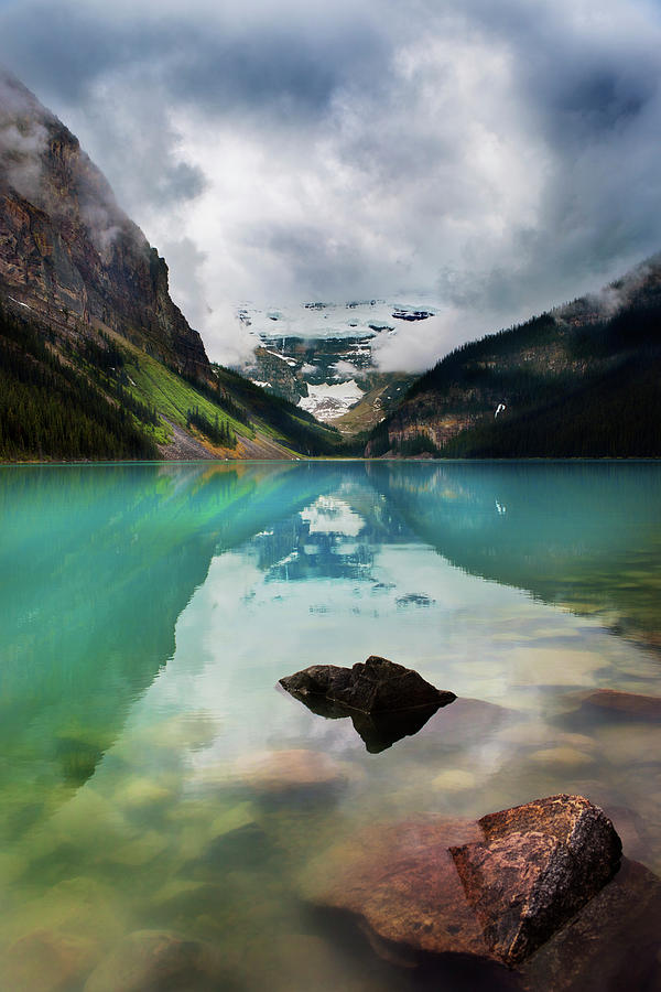 Mountains Reflected In Tranquil Lake Photograph by Steve Nagy / Design Pics