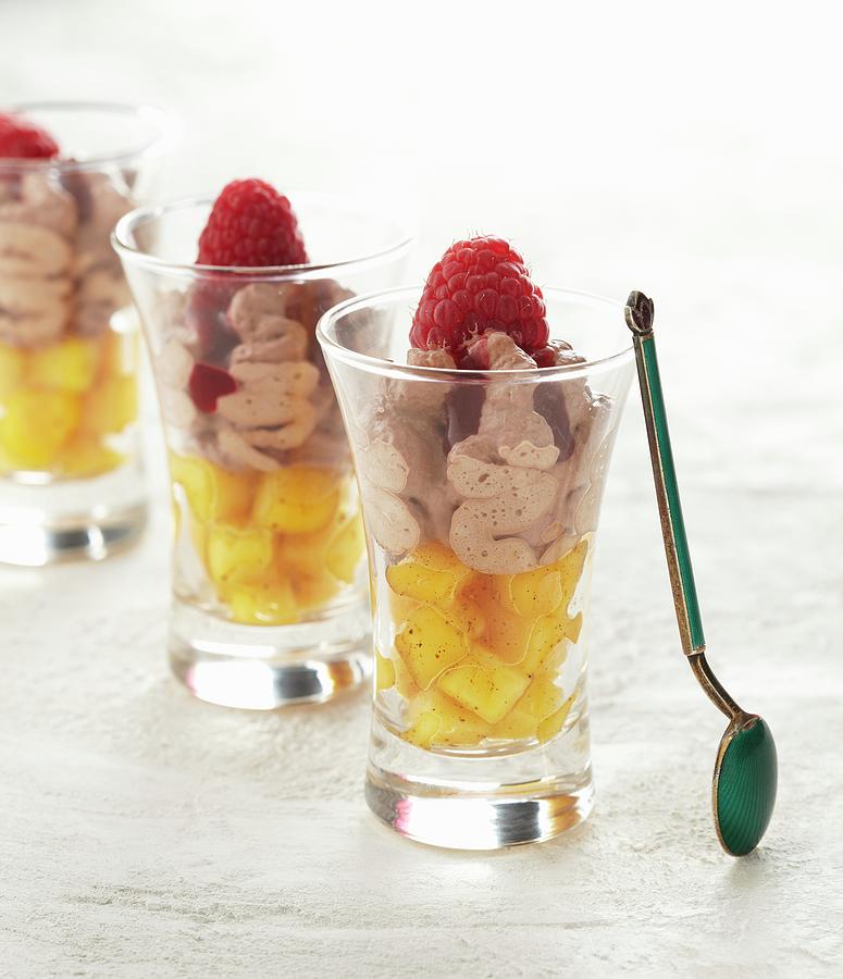 Mousse Au Chocolat On Top Of Diced Mango, With A Raspberry Sauce Photograph by Atelier Mai 98