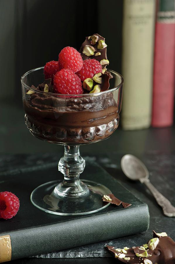 Mousse Au Chocolat With Fresh Raspberries In A Dessert Glass Photograph by Magdalena Hendey