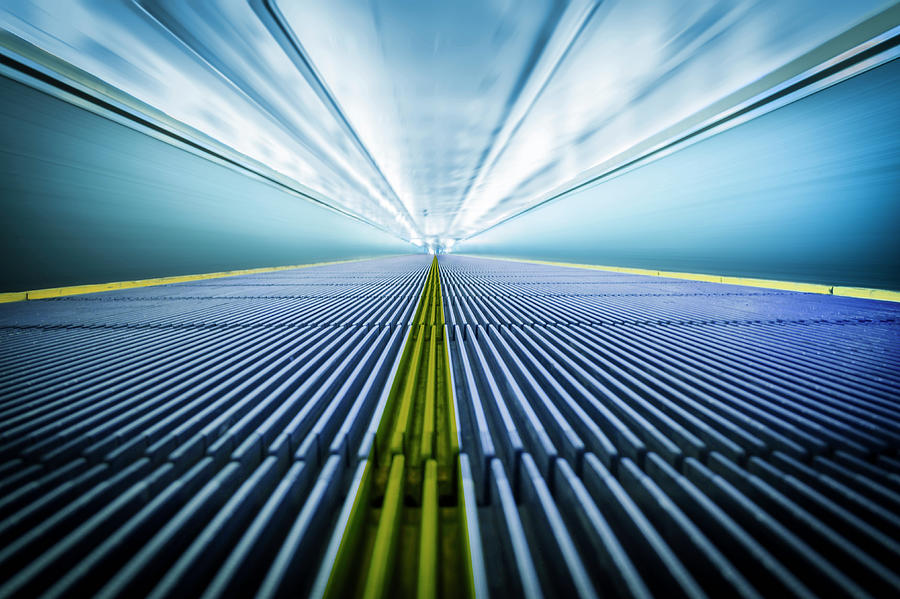 Moving Walkway At The Airport Photograph by Bjdlzx