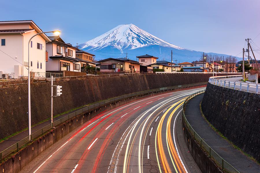 Rush Hour Movie Photograph - Mt. Fuji, Japan Over Neighborhoods by Sean Pavone