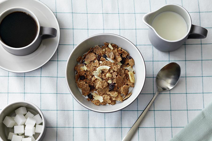 Muesli, Milk, Coffee And Sugar Cubes Photograph by Debby Lewis-harrison