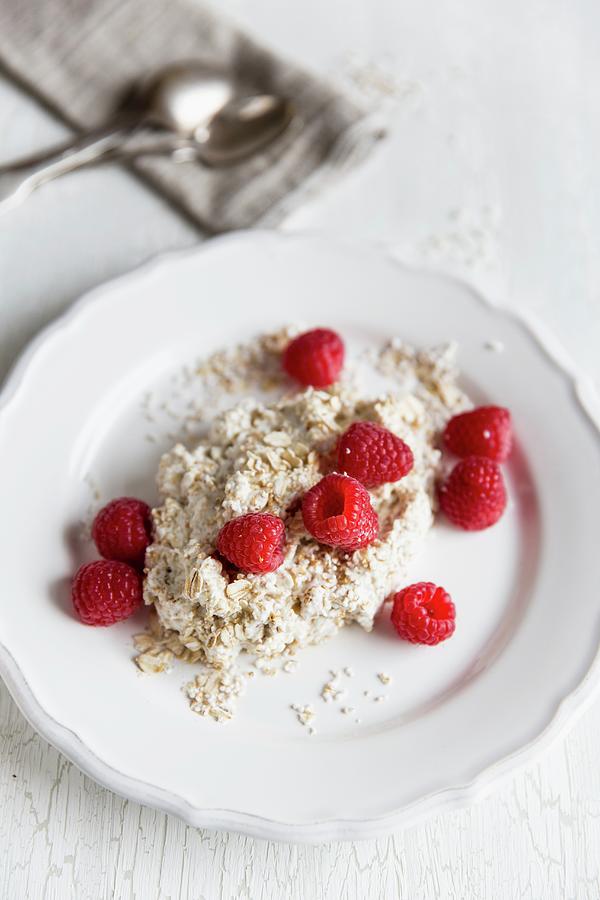 Muesli With Amaranth, Oats, Quark And Raspberries Photograph by Claudia Timmann