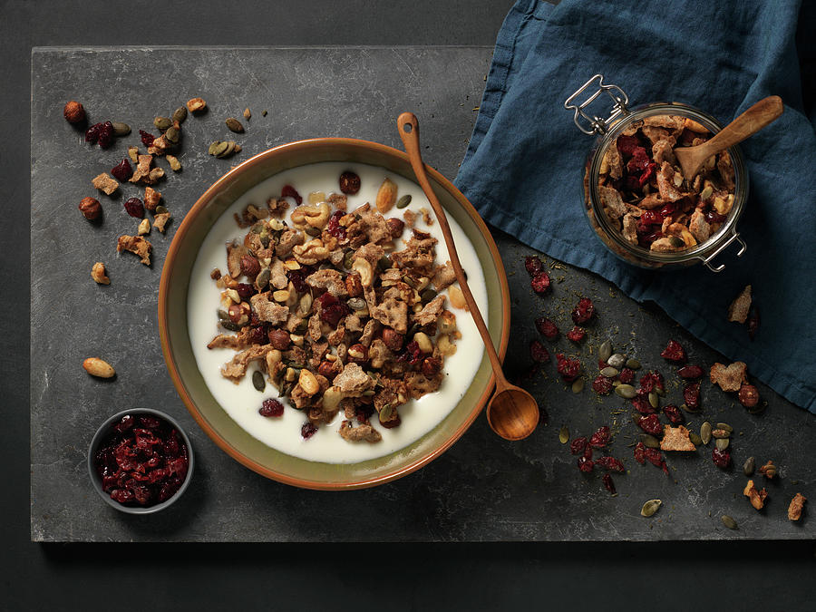 Muesli With Milk And Dried Fruit Photograph by Studio-344