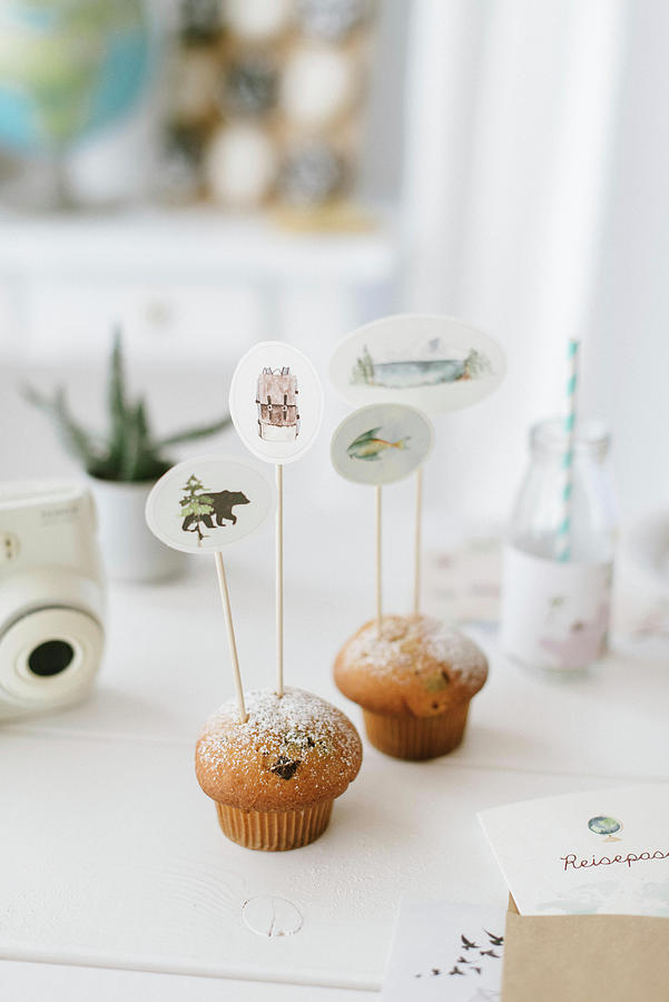 Muffins Decorated With Handmade Decorative Skewers For Childs Birthday Party Photograph by Katja Heil