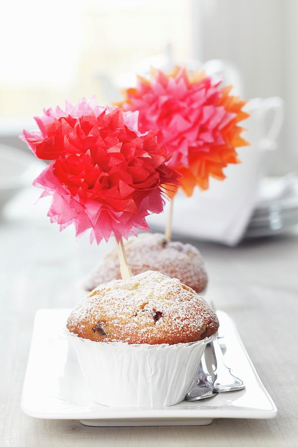 Muffins Decorated With Tissue Paper Pompoms Photograph by Franziska Taube