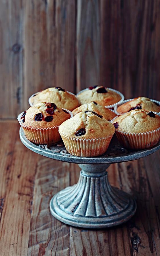 Muffins With Dried Cranberries On A Cake Stand Photograph by B.&.e.dudzinski