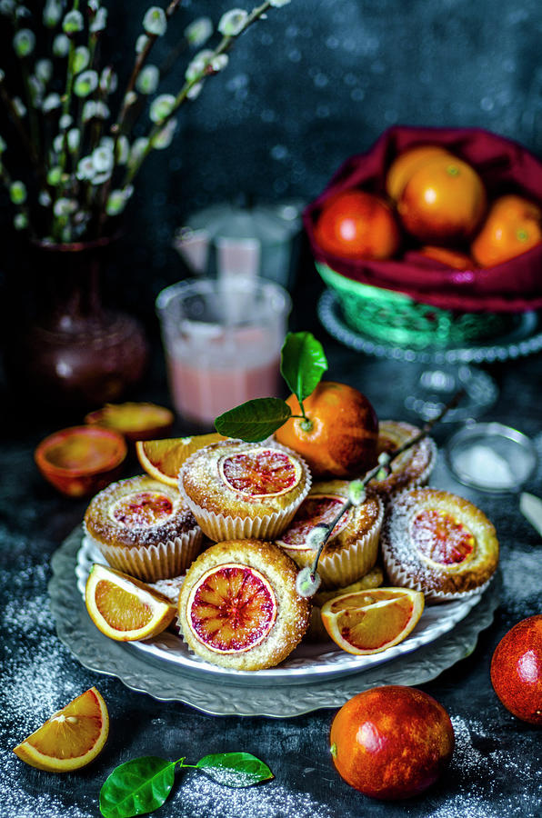 Muffins With Slices Of Red Orange Photograph by Gorobina