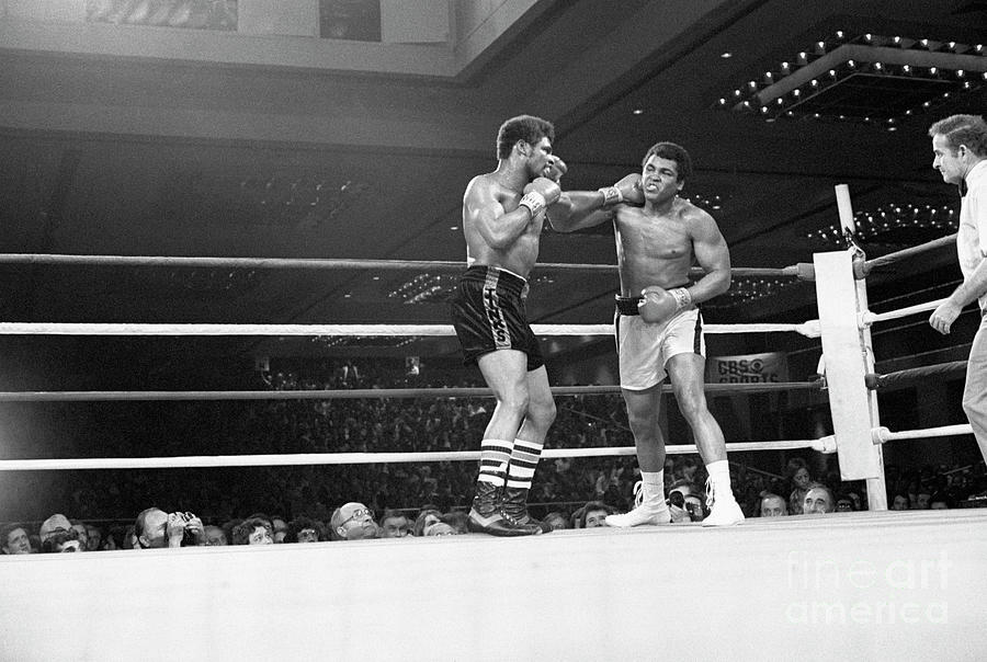 Las Vegas Photograph - Muhammad Ali & Leon Spinks Exchange Punc by Bettmann