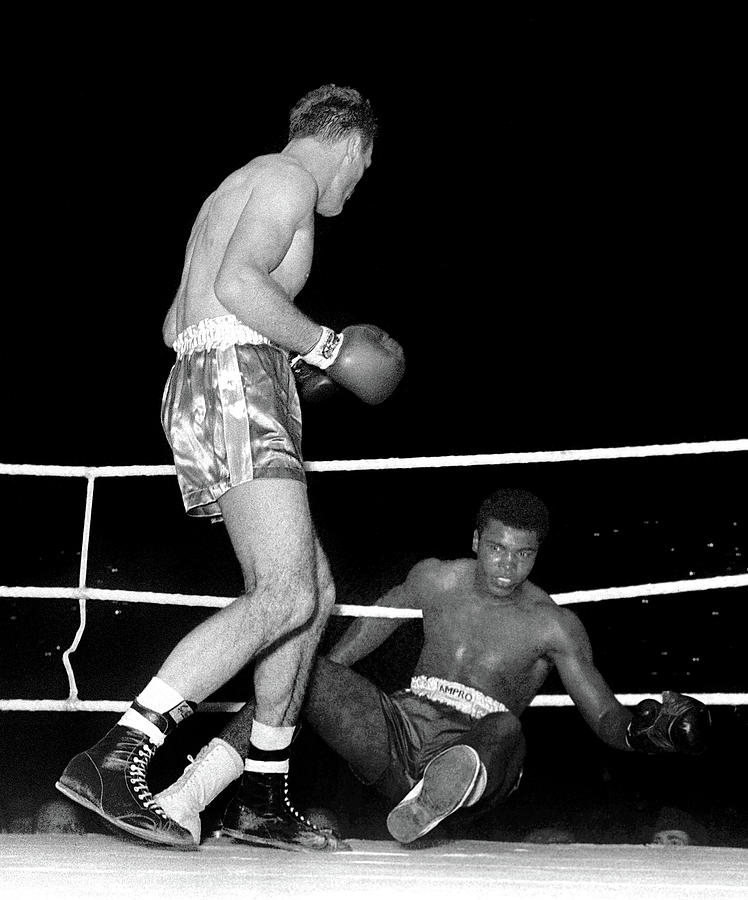 Muhammad Ali Hitting the Ropes vs. Henry Cooper  Photograph by Doc Braham
