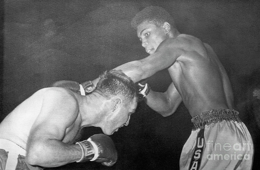 Muhammad Ali In First Professional Bout Photograph by Bettmann