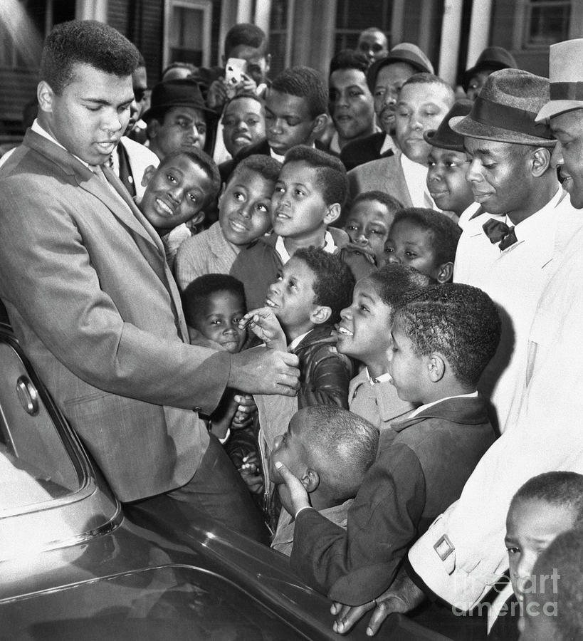 Muhammad Ali With Boys In Boston Photograph by Bettmann