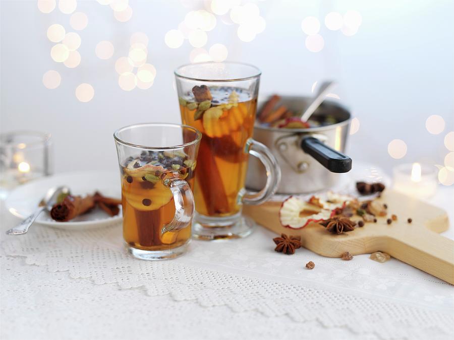 Mulled Cider With Apple Slices For Christmas Photograph by Ian Garlick