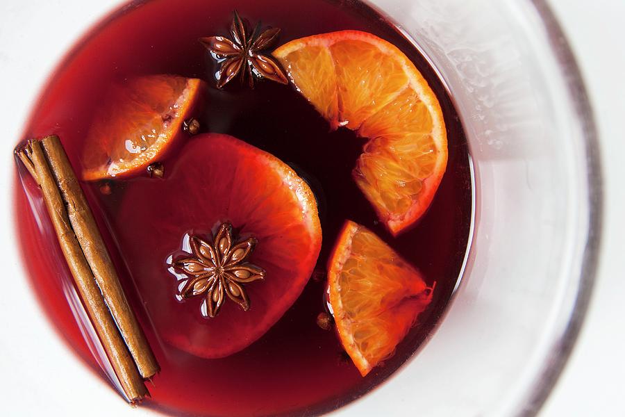 Mulled Red Wine With Spices And Fruit In A Glass Photograph by Stacy Grant