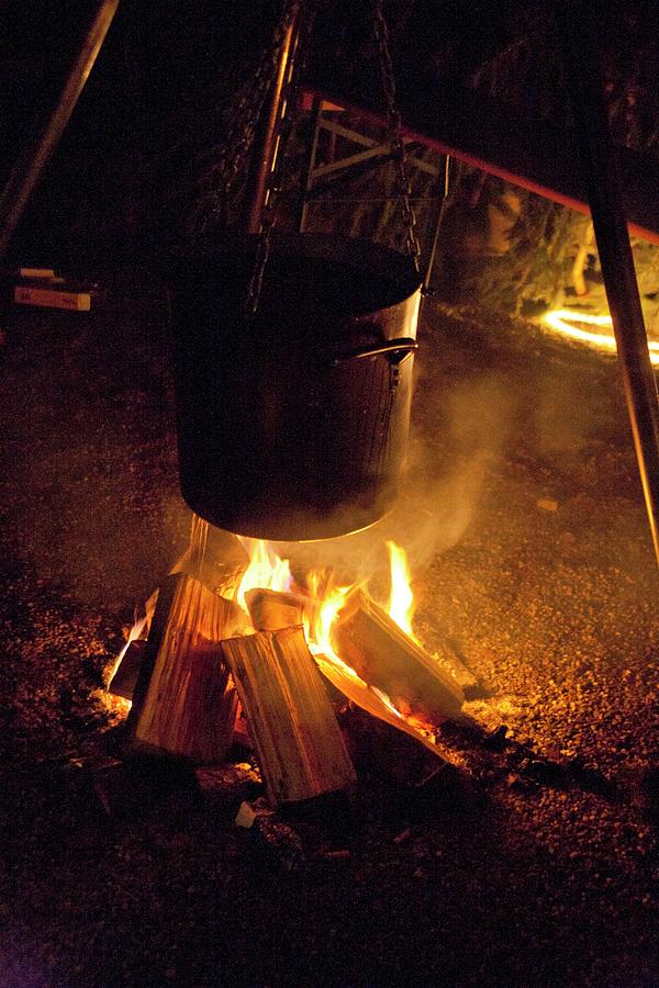Mulled Wine Warming Over Bonfire Photograph by Martina Schindler